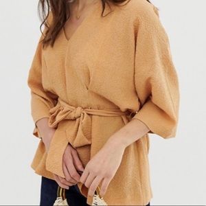 ASOS DESIGN Textured oversized top w/ tie waist